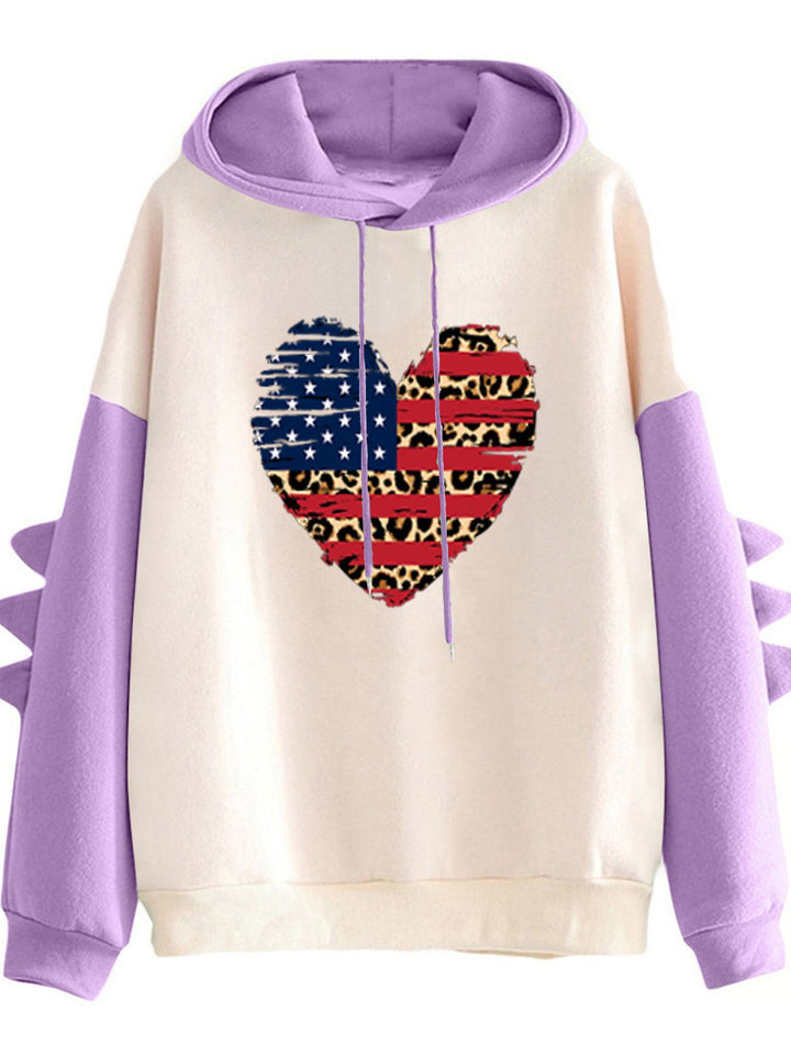 Dame hoodie med unikt hjerte design og trendy detaljer Stilla