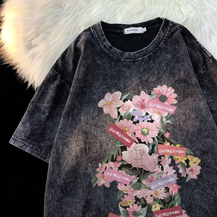 Dame Oversized T-shirt med floral grafisk tryk og afslappet snit Stilla