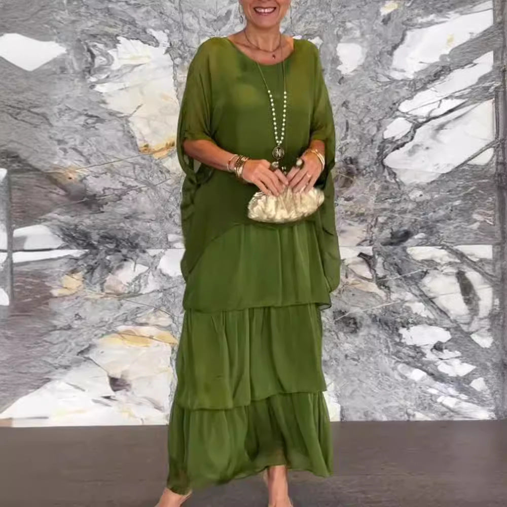 Dame maxikjole med flydende skirt og elegante flæsedetaljer Stilla