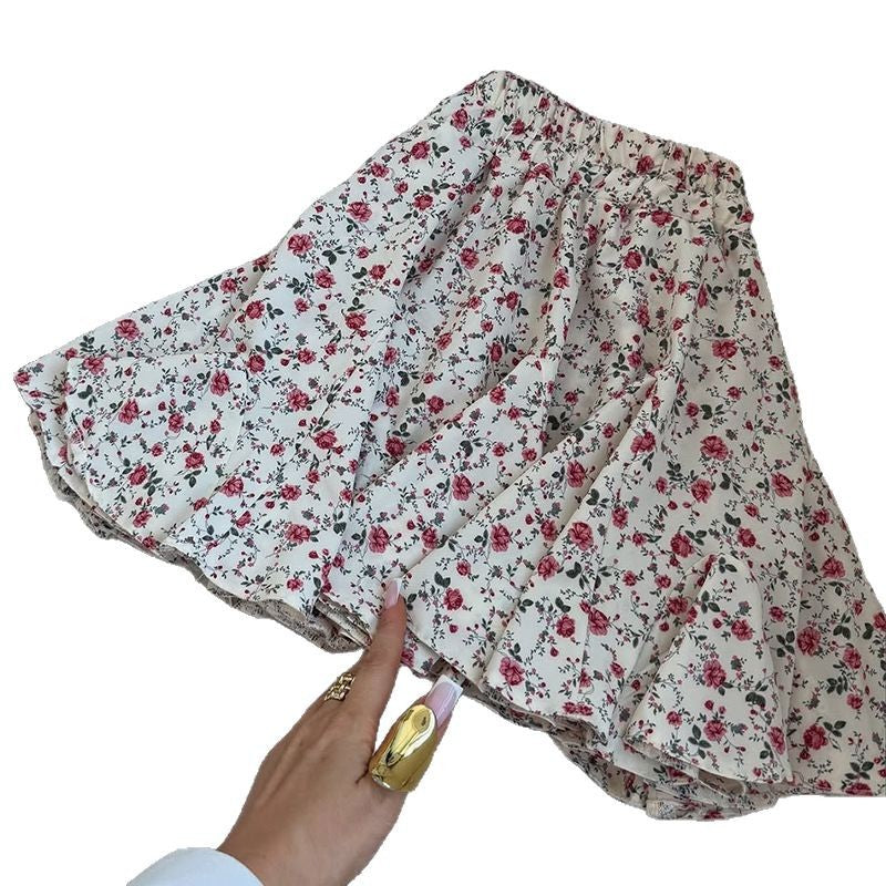 Dame flydende, knælængde nederdel med blomster mønster og elastisk talje Stilla