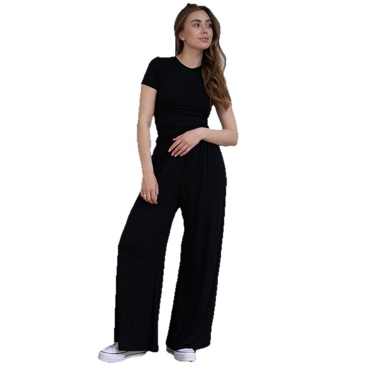 Dame elegant jumpsuit med figursyet overdel og vidde ben Stilla