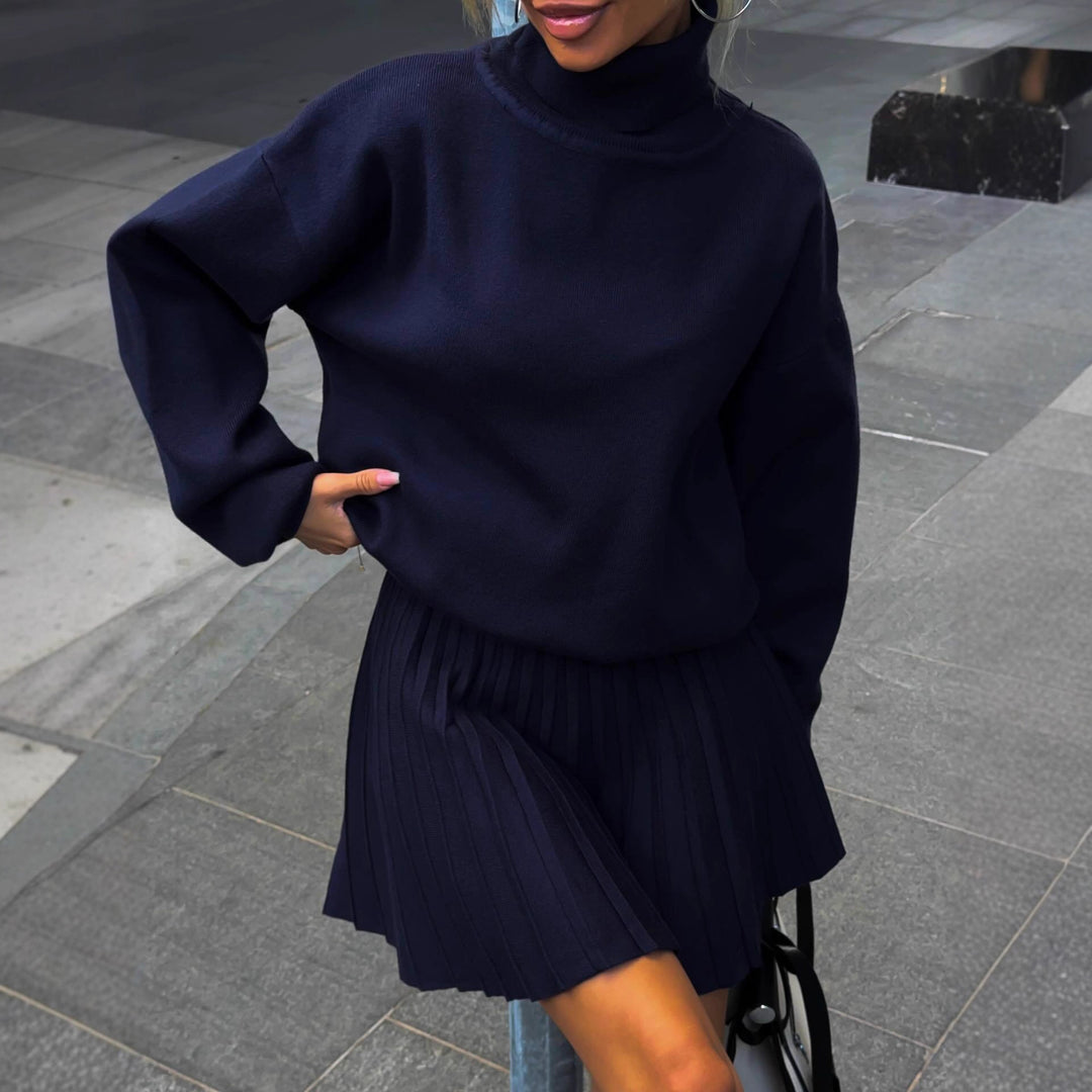 Kvindernes styling sæt med afslappet sweater og plisseret nederdel Stilla