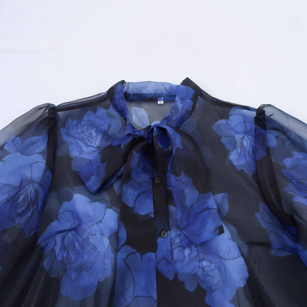 Femme Gennemsigtig Bluse med Blomstertryk og Slips-halsdetalje Stilla