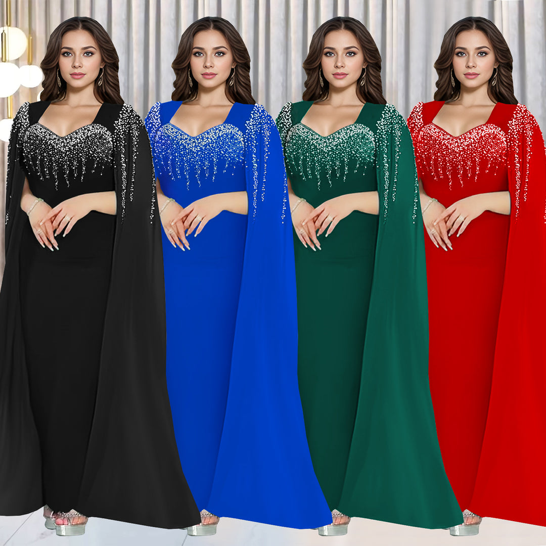 Dame Elegant aftenkjole med ædel kappe og glitrende detaljer Stilla