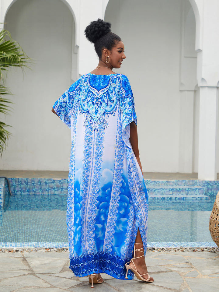 Dame lang kaftan med elegant blomsterdesign og sidelommer Stilla