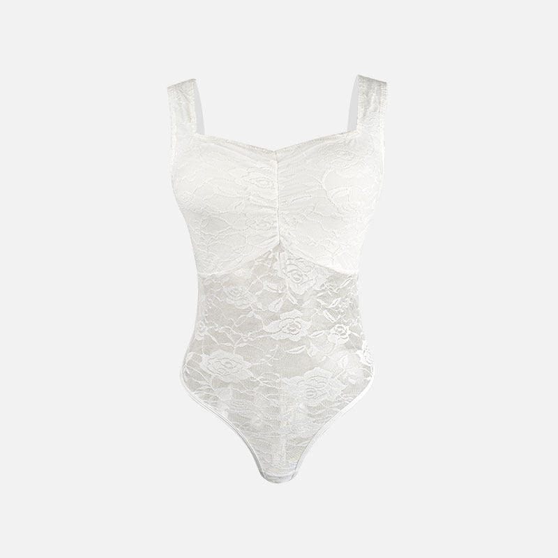 Dame spids-bodysuit med floral design og konturerende snit Stilla
