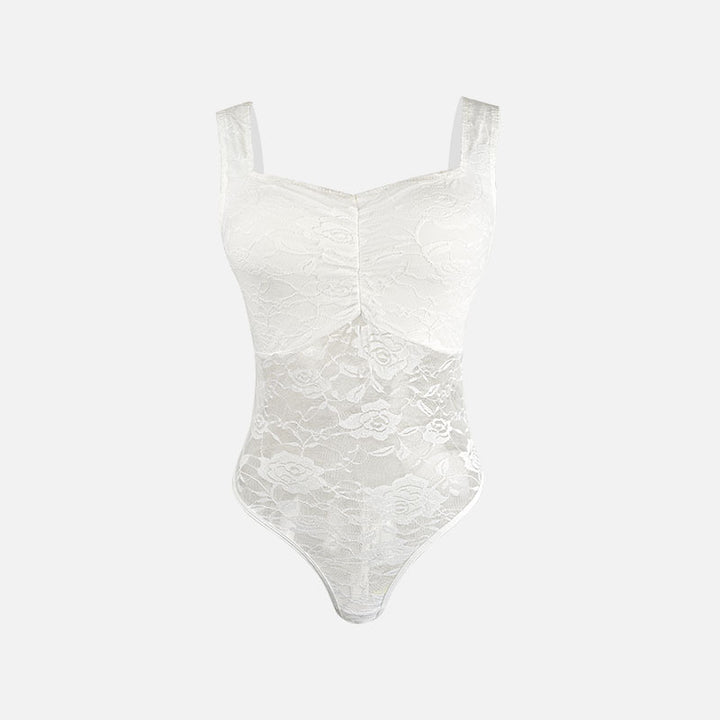 Dame spids-bodysuit med floral design og konturerende snit Stilla