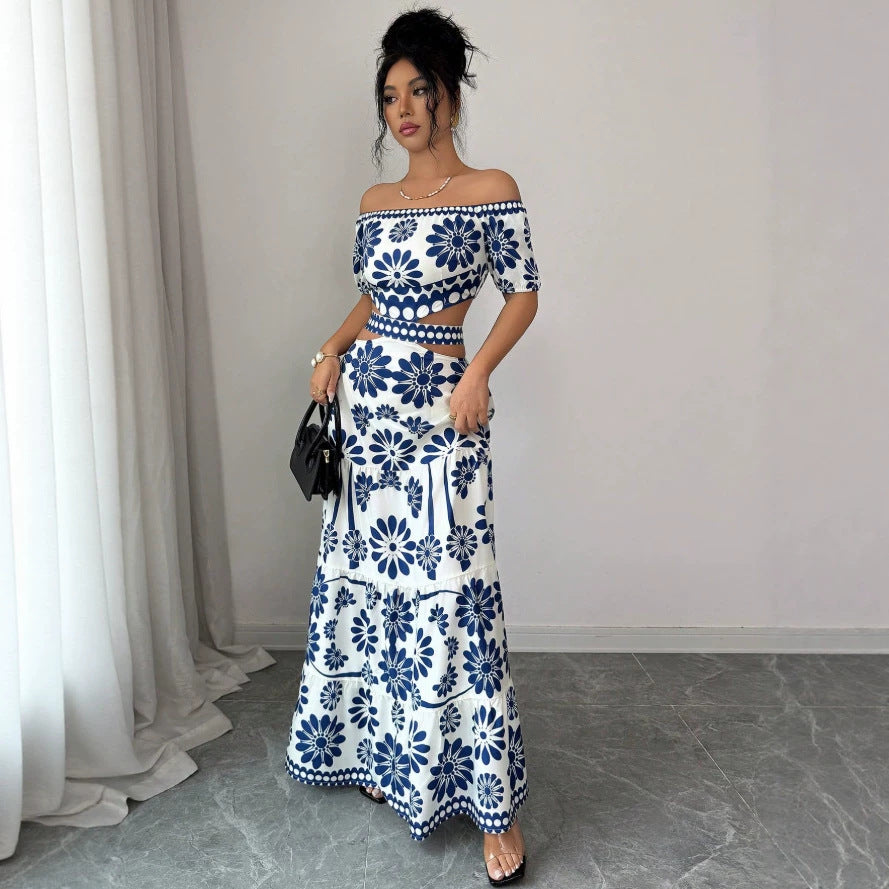 Dame maxikjole med blomstret design og trendy off-shoulder udskæring Skovae