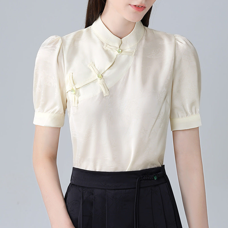 Damebluse med elegant ståkrave og kunstneriske knapdetaljer Stilla