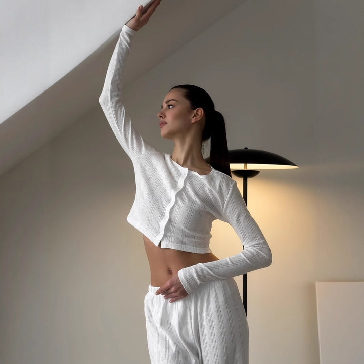 Kvinders komfortable loungedragt med elegant stribedesign og løs pasform