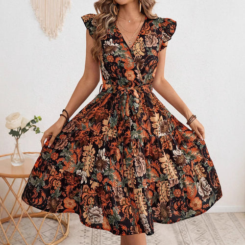 Dame wrap dress med voluminøse flæsedetaljer og blomster mønster Stilla