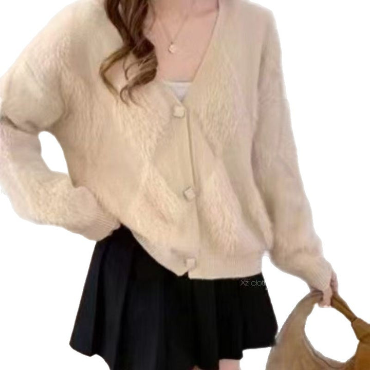 Kvindernes fluffy cardigan med knapdetaljer Stilla