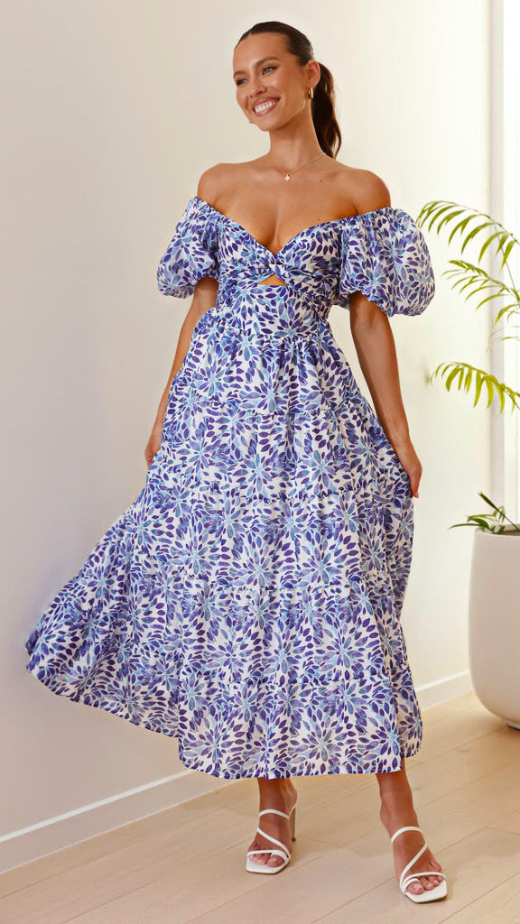 Dame maxikjole med voluminøse puffærmer og blomstret design Stilla