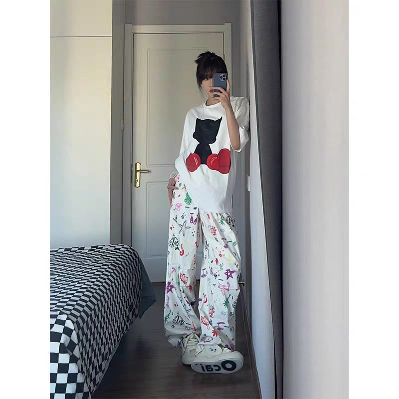 Dame T-shirt med kreativt grafikmotiv og afslappet snit Stilla