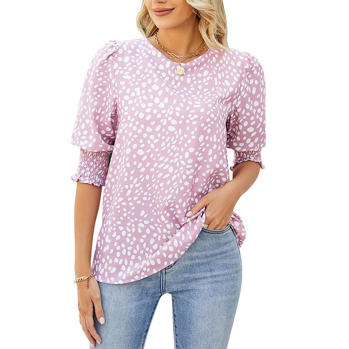 Damebluse med puffærmer og moderne prikkedesign Stilla