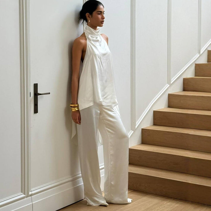 Dame elegant satineret heldragt med asymmetrisk snit Skovae
