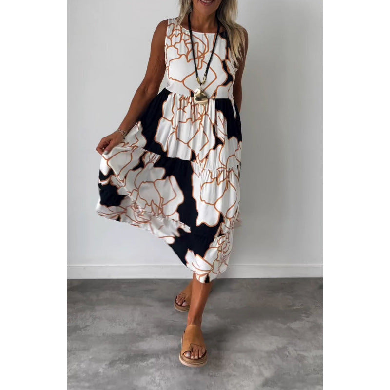 Dame Maxikjole med floral design og asymmetrisk kant Stilla