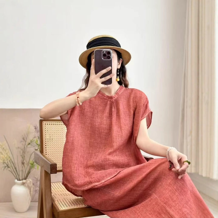 Femme Relaxed Fit Knap-Up Bluse med High-Low Sømbund Stilla