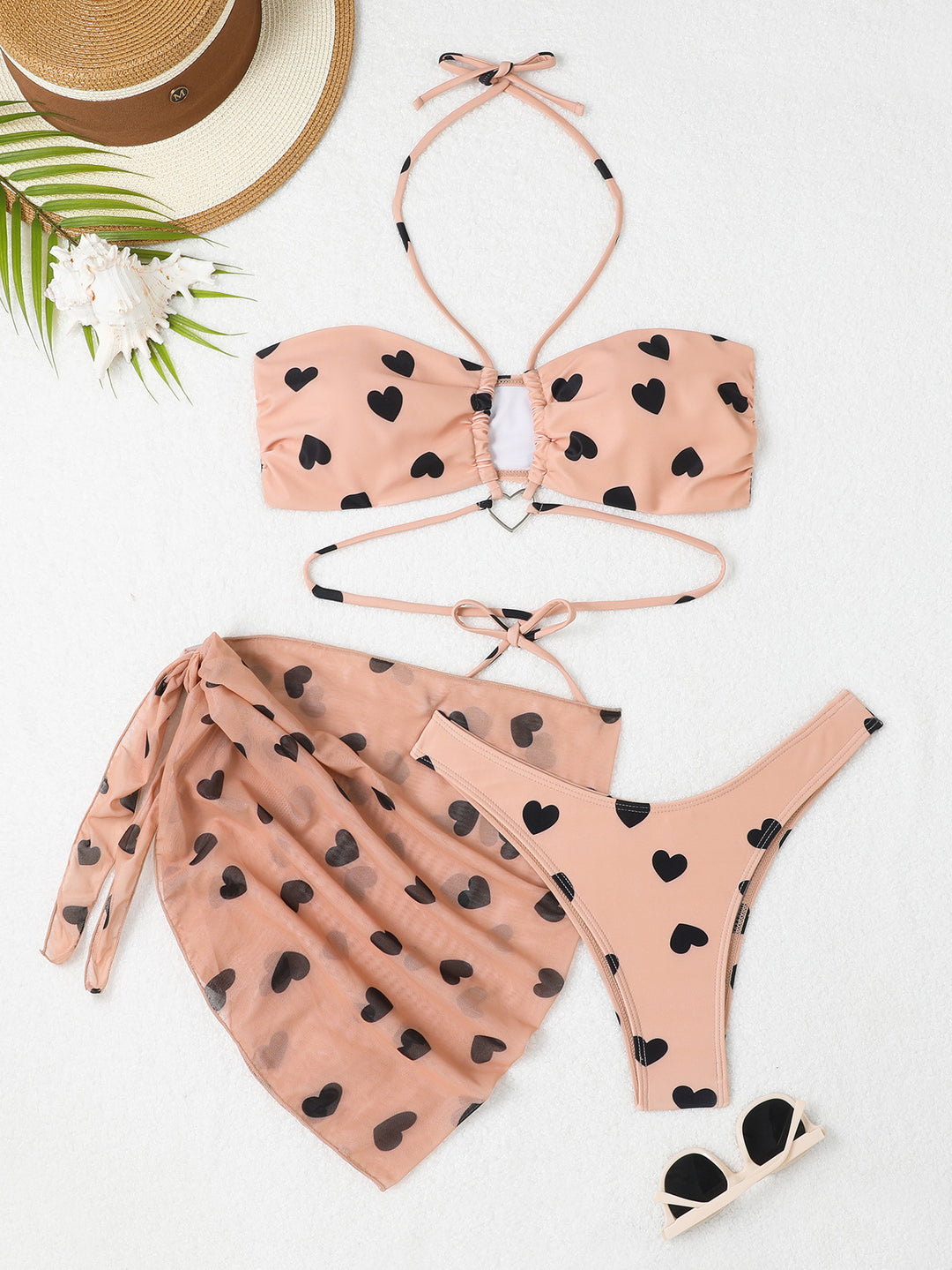 Dame bandeau-bikini med legende hjerte-motiv og gennemsigtig indviklet nederdel Stilla