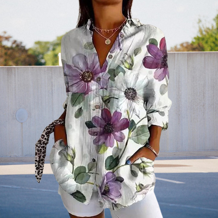 Damebluse med blomsterdesign og praktiske lommer Stilla