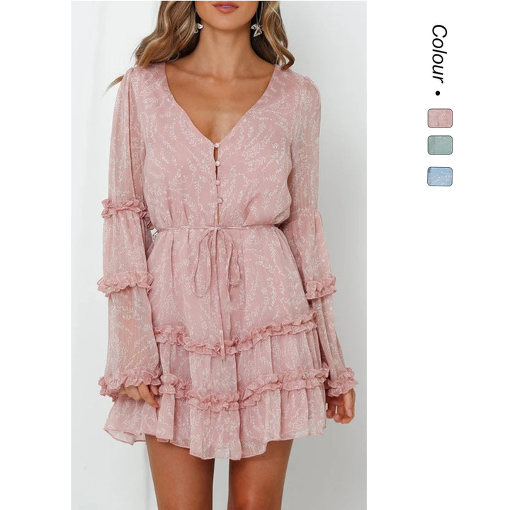 Women's ruffled dress with long, transparent sleeve and tie belt Skovae