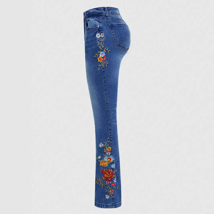 Damejeans med blomsterbroderier og vidde ben Stilla