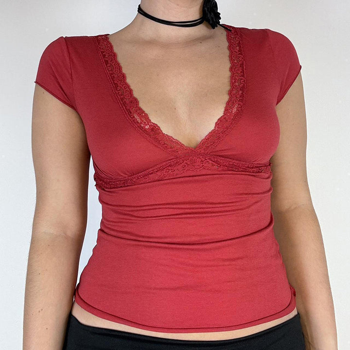Damer Elegant top med spidse- og draperingselementer Skovae