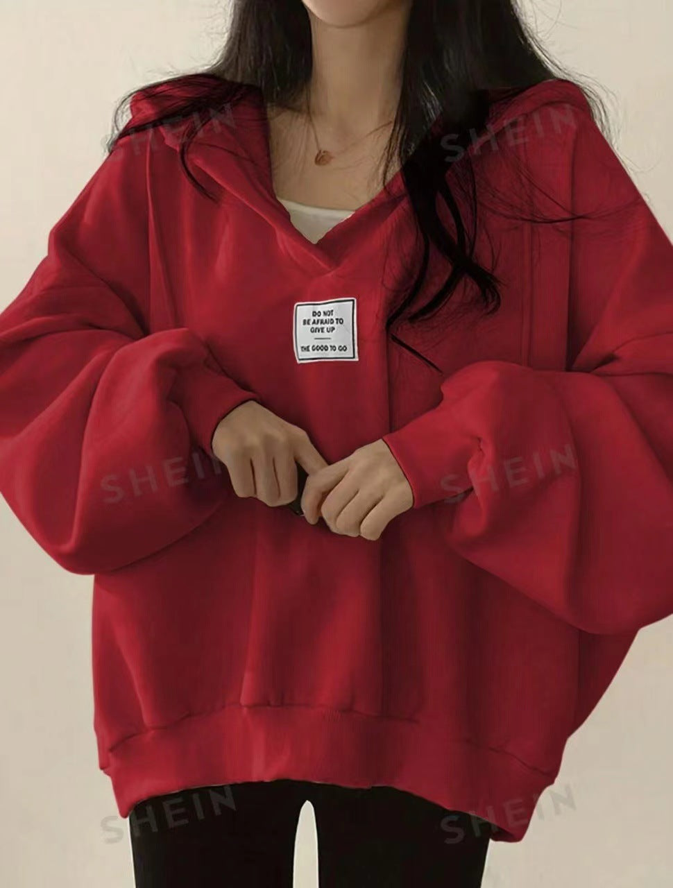 Femme Oversized Hoodie med unikt grafisk detalje Stilla