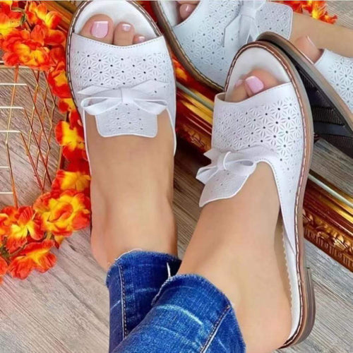 Dame trendy tæerimuler-sandaler med blomstermotiv og dekorativt sløjfedetalje Stilla