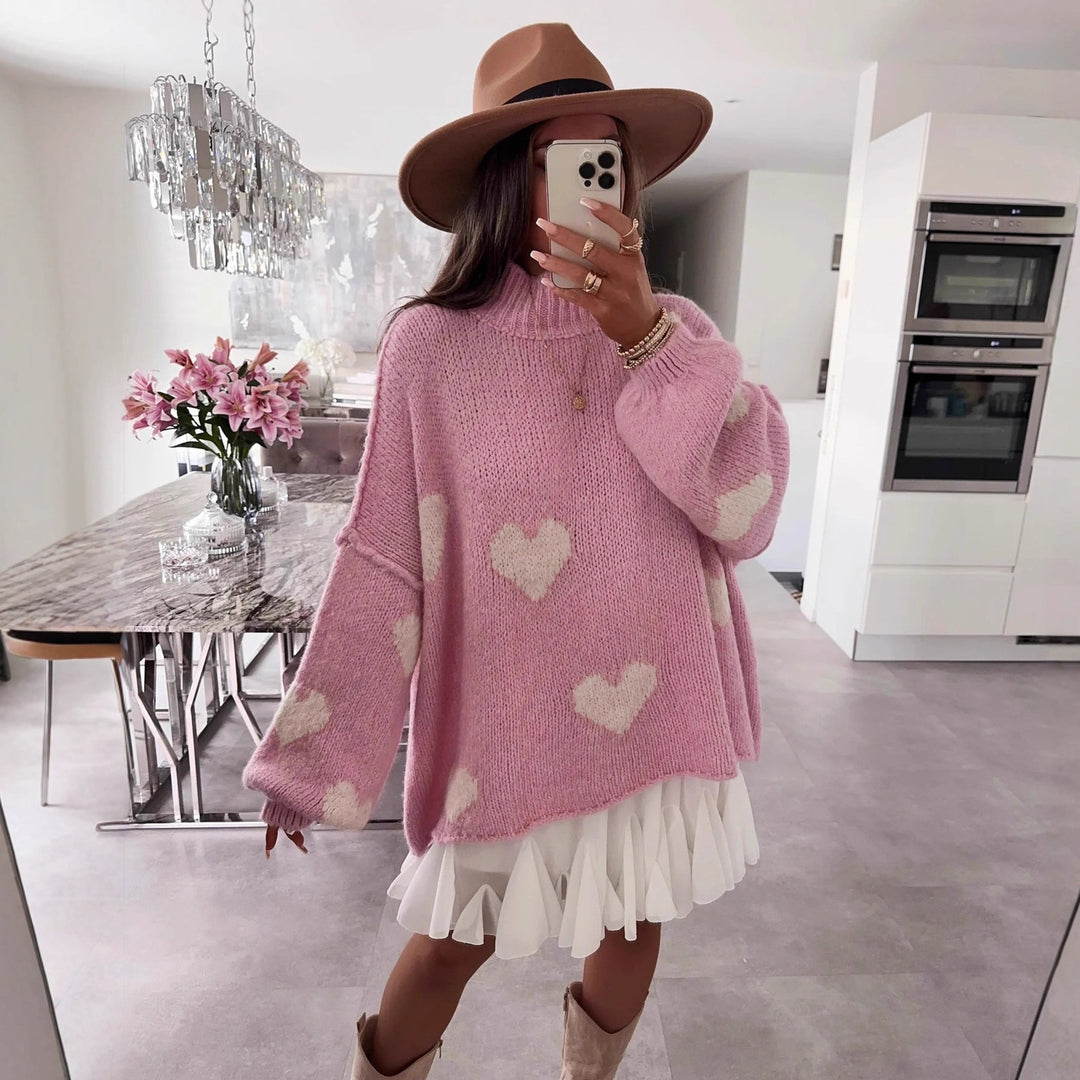 Kvindes moderigtige oversized sweater med hjerteformet mønster og voluminøse ærmer Stilla