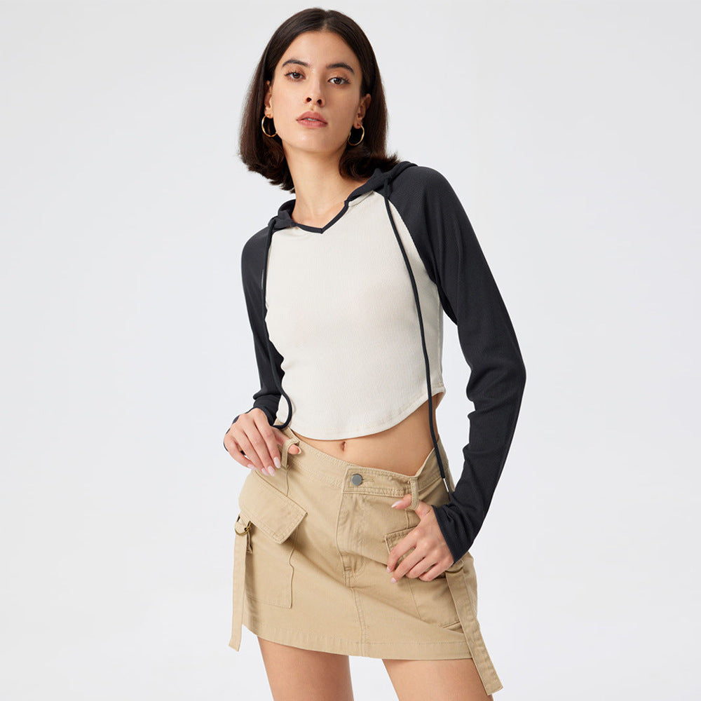 Kvinders cropped sports top med hætte og lange ærmer Stilla