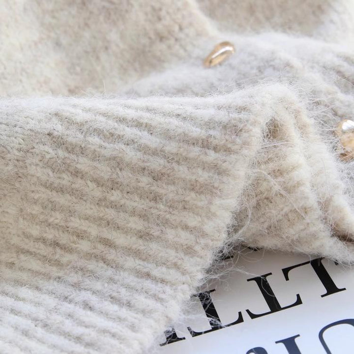 Kvinders hyggelige cardigan med hjerteknapdetaljer og bueaccent Stilla