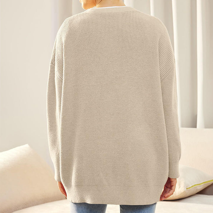 Dame strikjakke med oversized snit og knapdetaljer Stilla