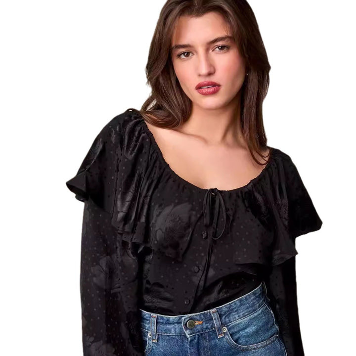 Damebluse med voluminøse flæsedetaljer og elegant V-hals Stilla