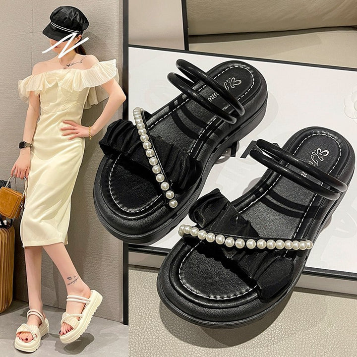 Dame sandaler med raffineret flæsedesign og elegante perledetaljer Stilla