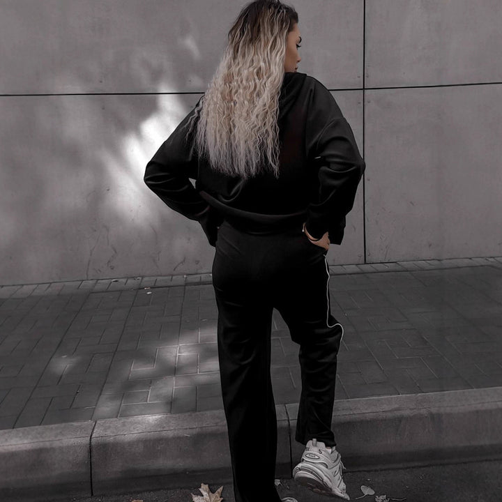 Kvinders sporty-elegante fleece joggingdragt med lynlås Skovae