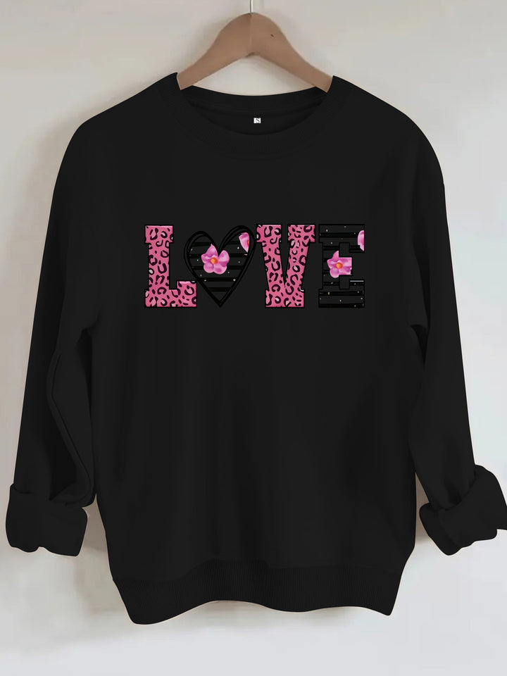 Kvinders sweatshirt med moderne leopard hjerte design og behagelig pasform Stilla