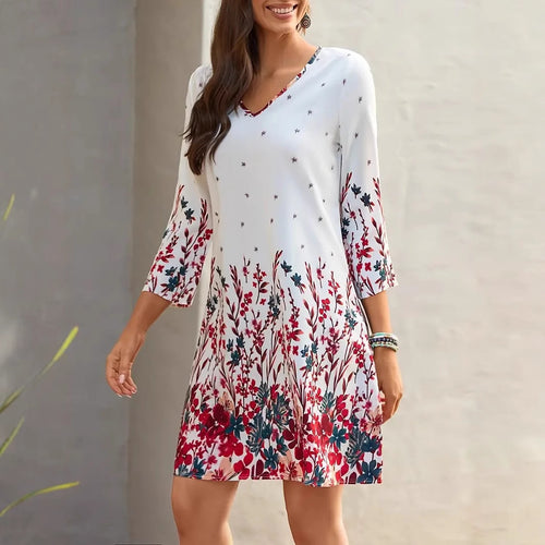 Dame fritidskjole med smart V-hals og floral print Stilla