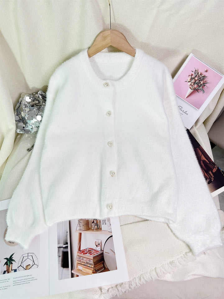Kvindernes hyggelige cardigan med perlebesatte knapper og moderne snit Stilla