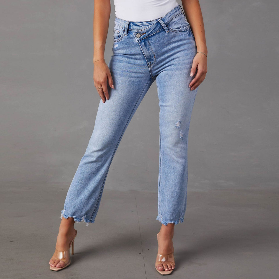 Dame Bootcut Jeans med frynset kanter og modepræget karakter Stilla