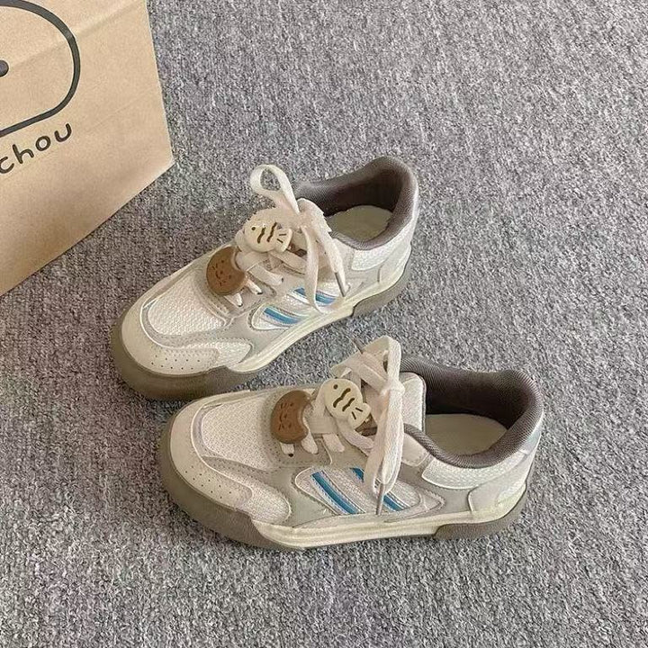 Dame sportlige sneakers med åndbart tekstiloverflade og unikke accenter Stilla
