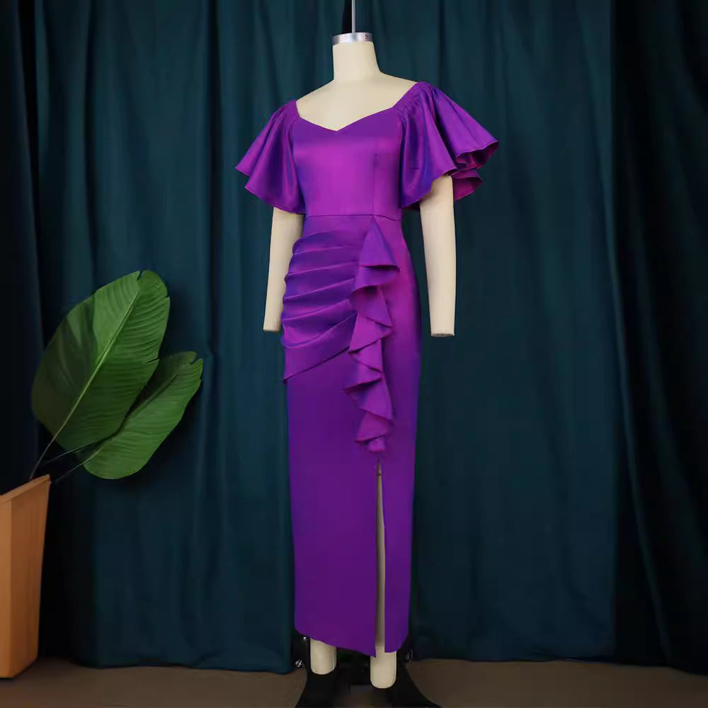 Damer Elegante Maxikjole med voluminøse ærmer og asymmetrisk flæse-design Skovae