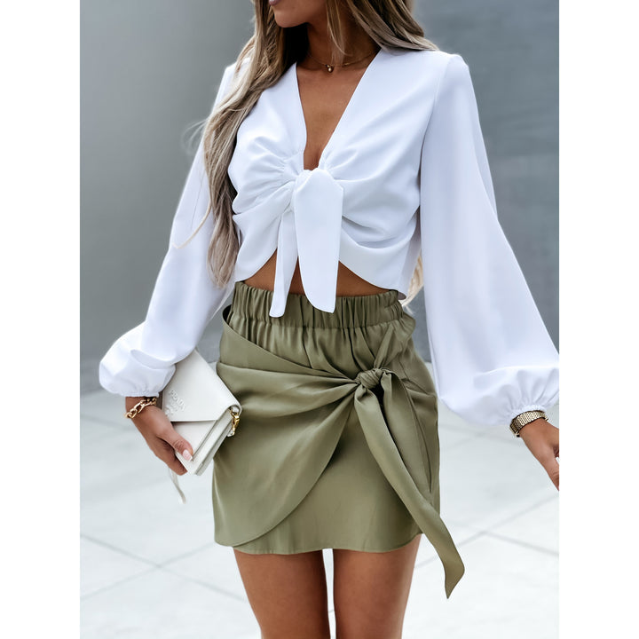 Damer Cropped Bluse med dekorativ knude og vidte ærmer Stiila