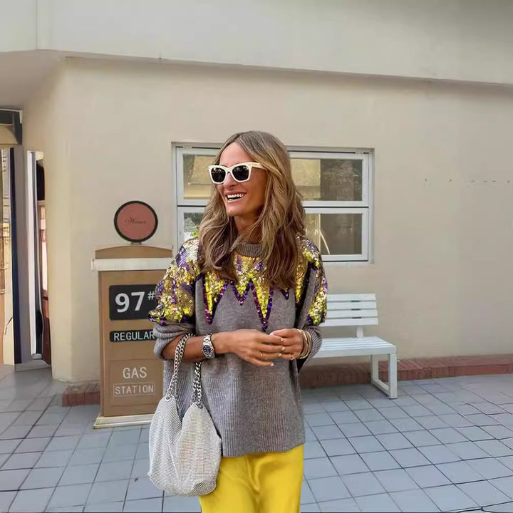 Dame glitrende oversized sweater med unikt design og glitrende detaljer Skovae