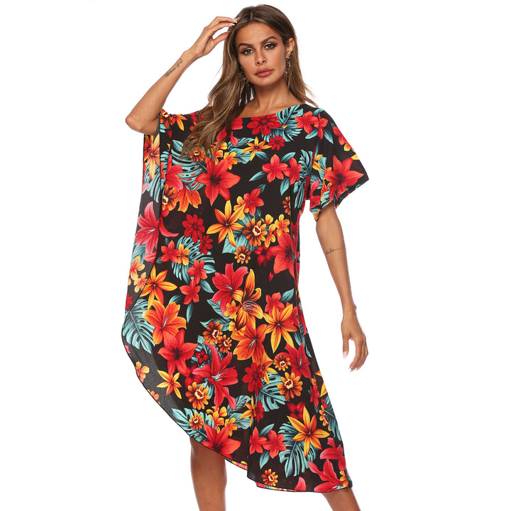 Dame Strandtunika med floral design og asymmetrisk skæring Stilla