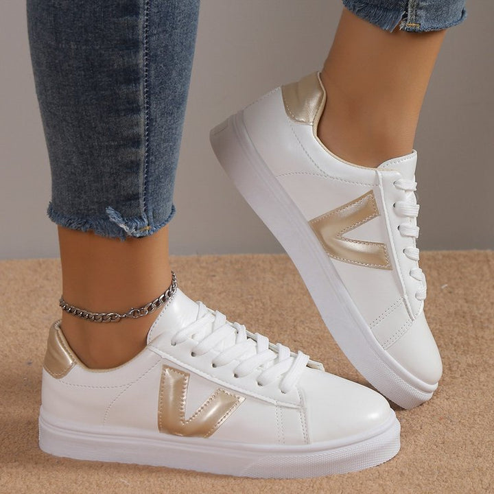 Dame Sportliche Sneakers med glitrende accenter Stilla