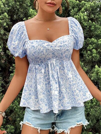 Damebluse med puffærmer og blomsterdesign Stilla