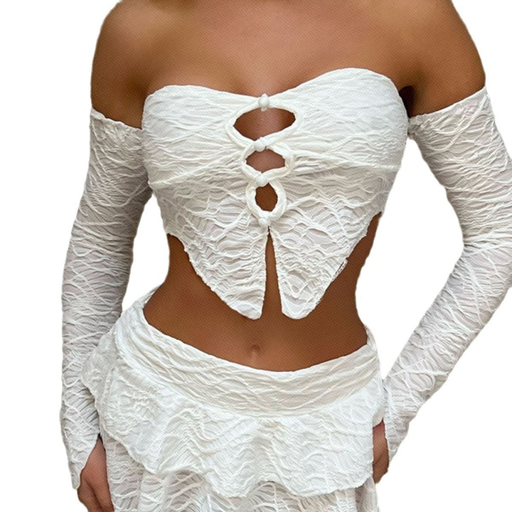 Dame cropped top med unikt knude design og raffinerede ærmer Skovae