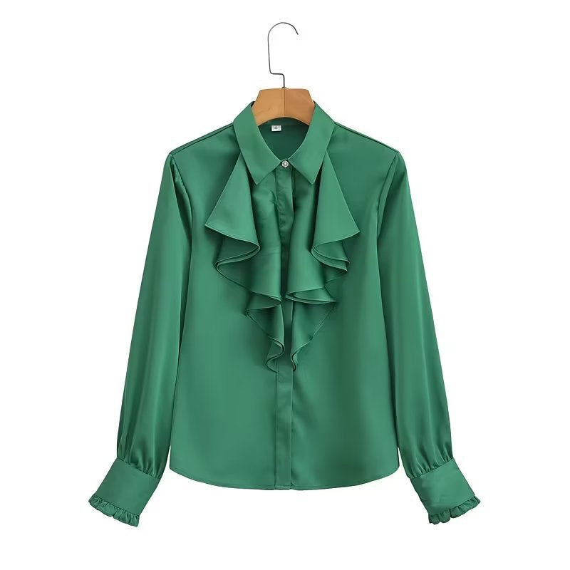 Damebluse med voluminøse flæser og elegant snit Stilla