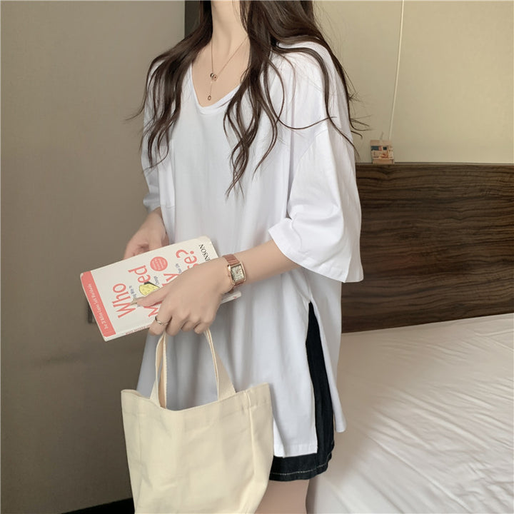 Femme afslappet oversized V-hals T-shirt med lomme Stilla